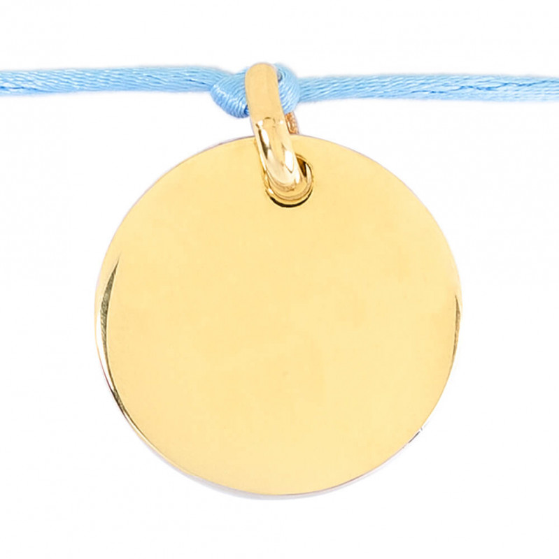 Bracelet avec rond en plaqué or gravé et cordon bleu
