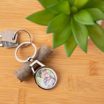 Porte clef acier ovale personnalisé avec une photo