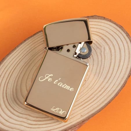 Zippo slim doré gravé