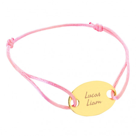 Bracelet élégant avec son cordon rose et son disque plaqué or personnalisé