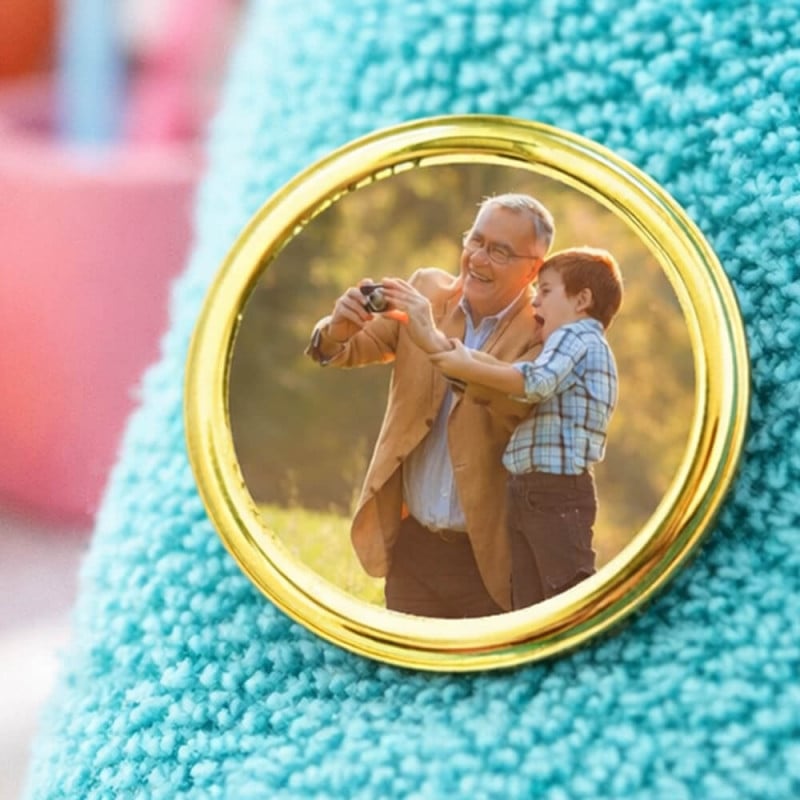 Pin's rond doré photo